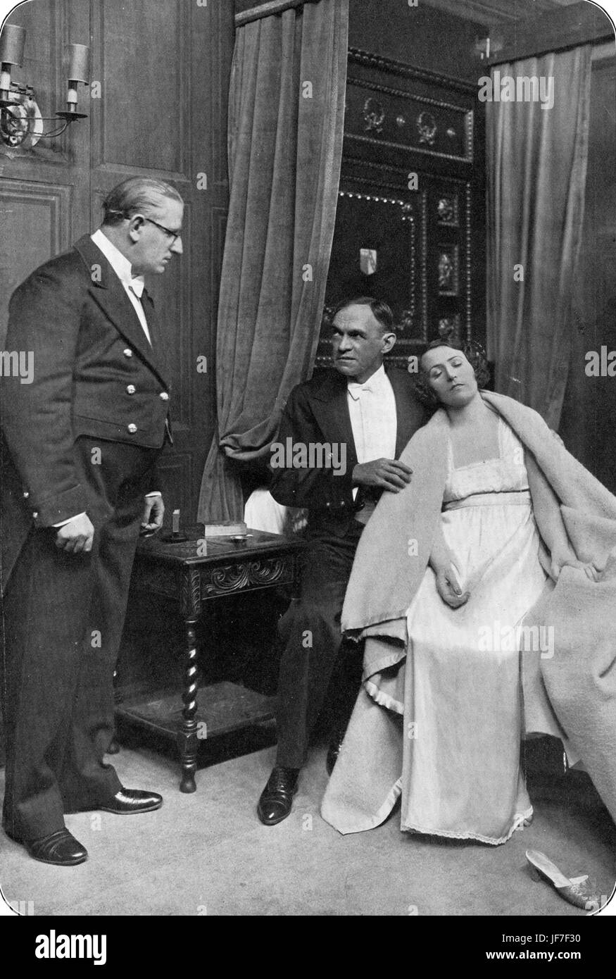 'The Case of the Frightened Lady' by Edgar    Joyce Kennedy as Isla. (1898-1943). Caption reads: 'Brooks:  Where are you going to take her? Gilder: To my room. Brooks: Does the old woman know?'.   London production Wyndham's Theatre, 18 August 1931. Stock Photo