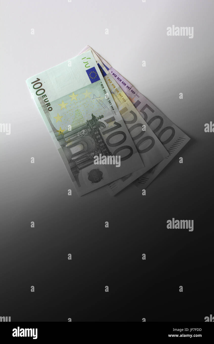 Euro banknotes disappearing into black, unregulated capital market concept, copy space Stock Photo