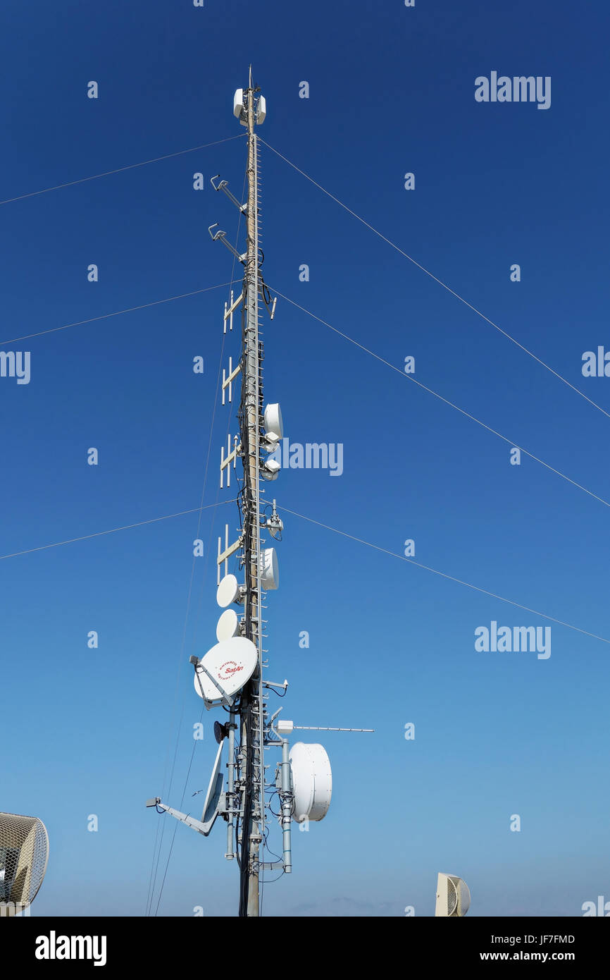 Radio and data communications masts at the Castle of Santa Barbara, Alicante, Spain. Stock Photo