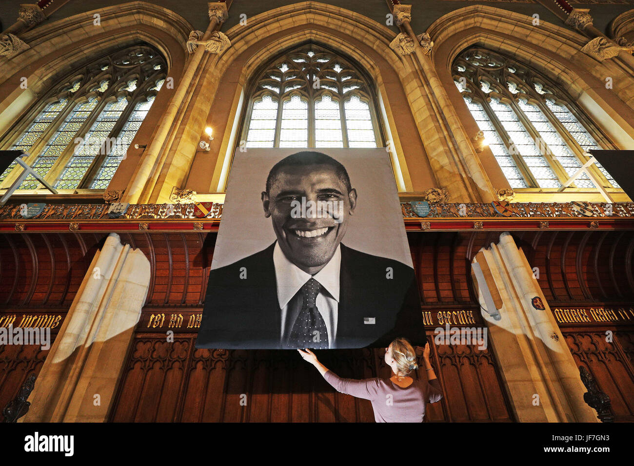 Final adjustments are made to the first ever art exhibition to be curated in St Cuthbert's Chapel at Ushaw in Durham, six two-metre high tapestry portraits from American hyper-realist artist Chuck Close. Stock Photo