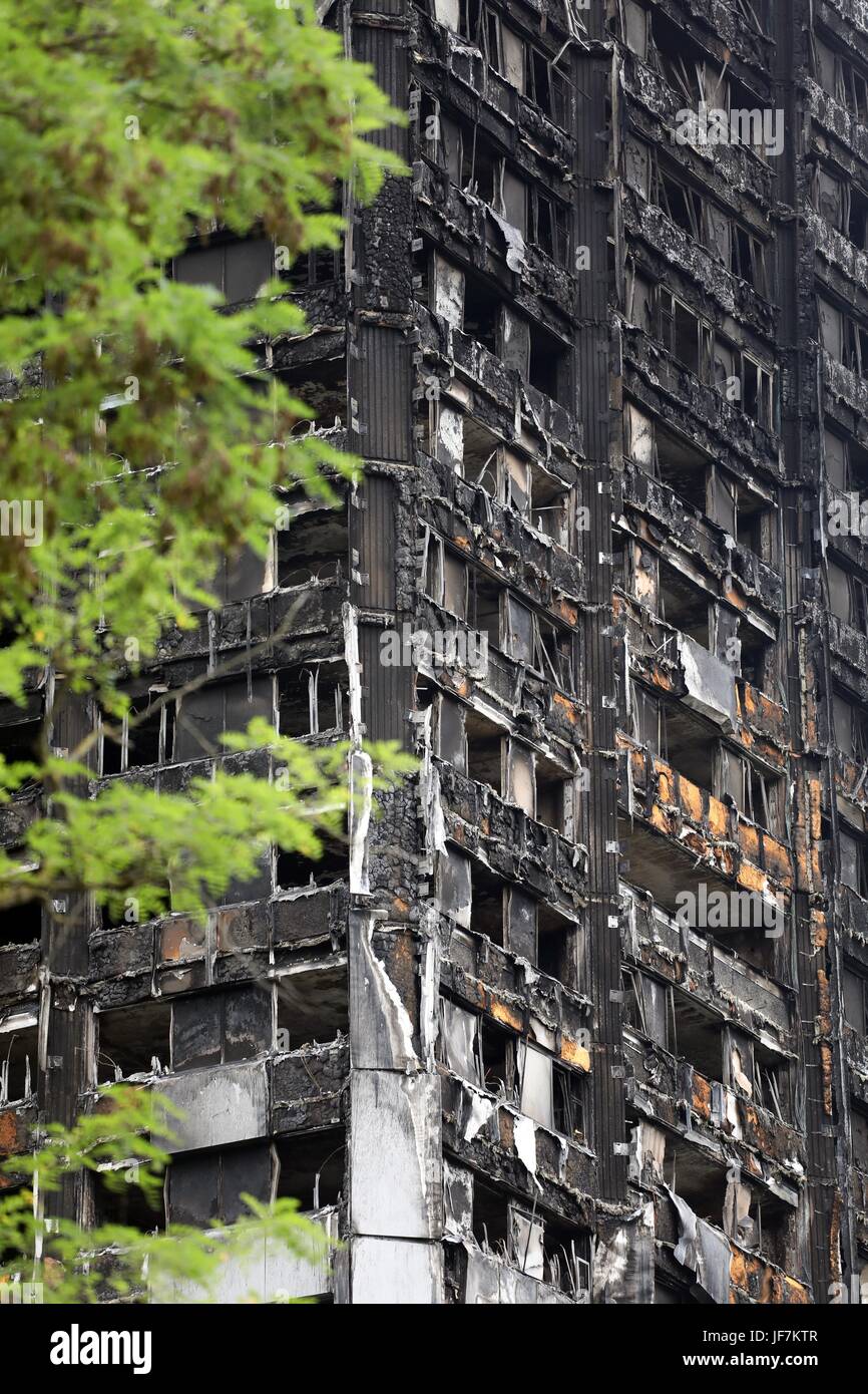 Grenfell Tower burnt out shell and tributes to the dead Stock Photo - Alamy