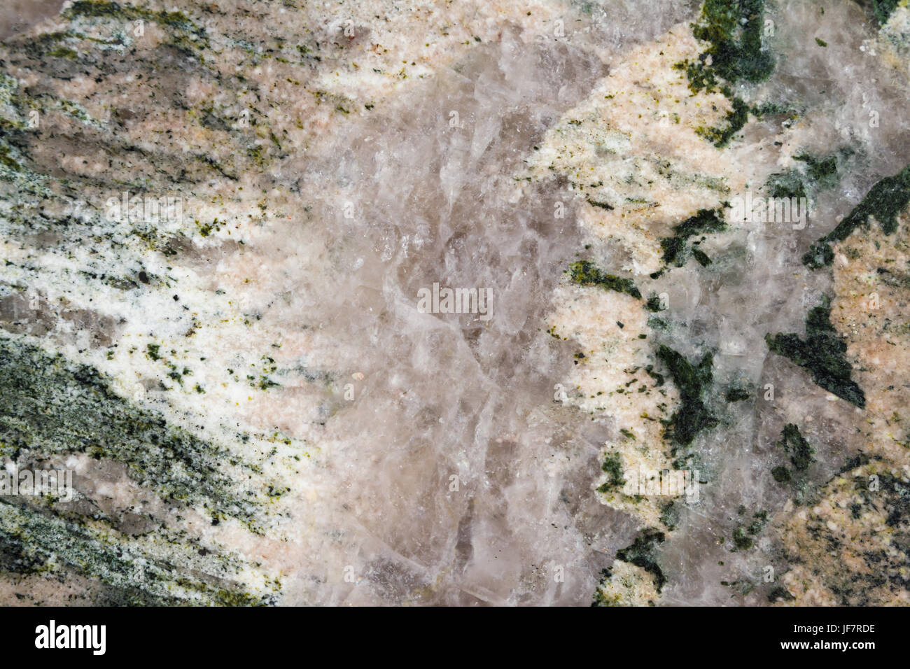 Close Up Of Green Granite Countertop With A Vein Of Quartz Crystal