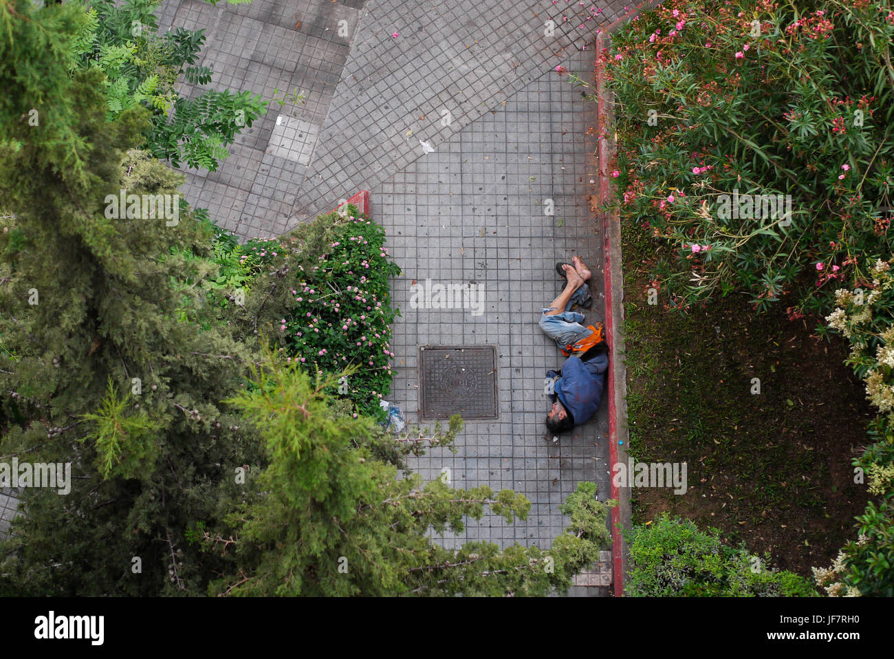 Homeless people sleeping in the street, Athens (Greece Stock Photo - Alamy