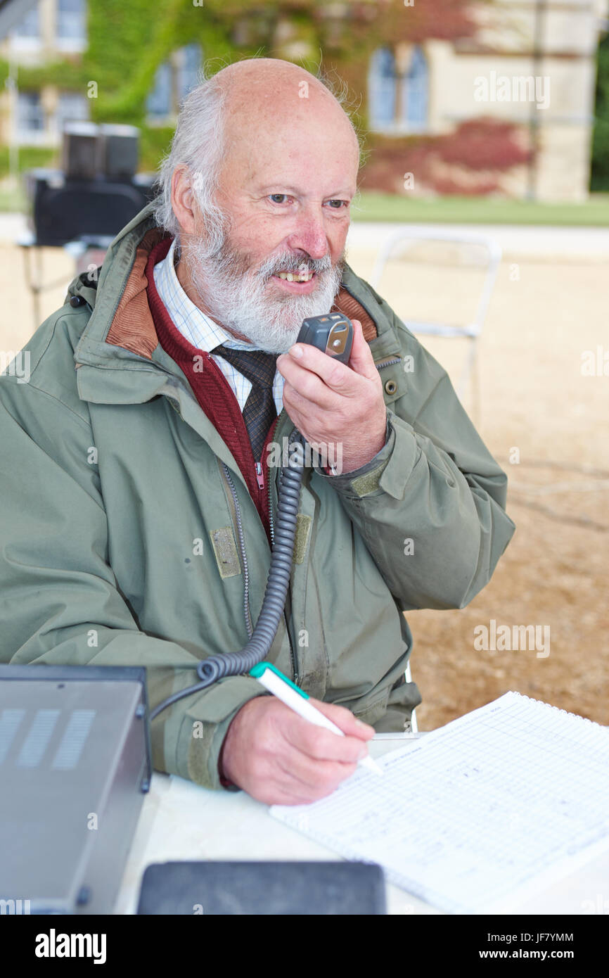 Volunteer speaks to local churches using a ham radio as part of the Ride and Stride cycle event in Oxford Stock Photo