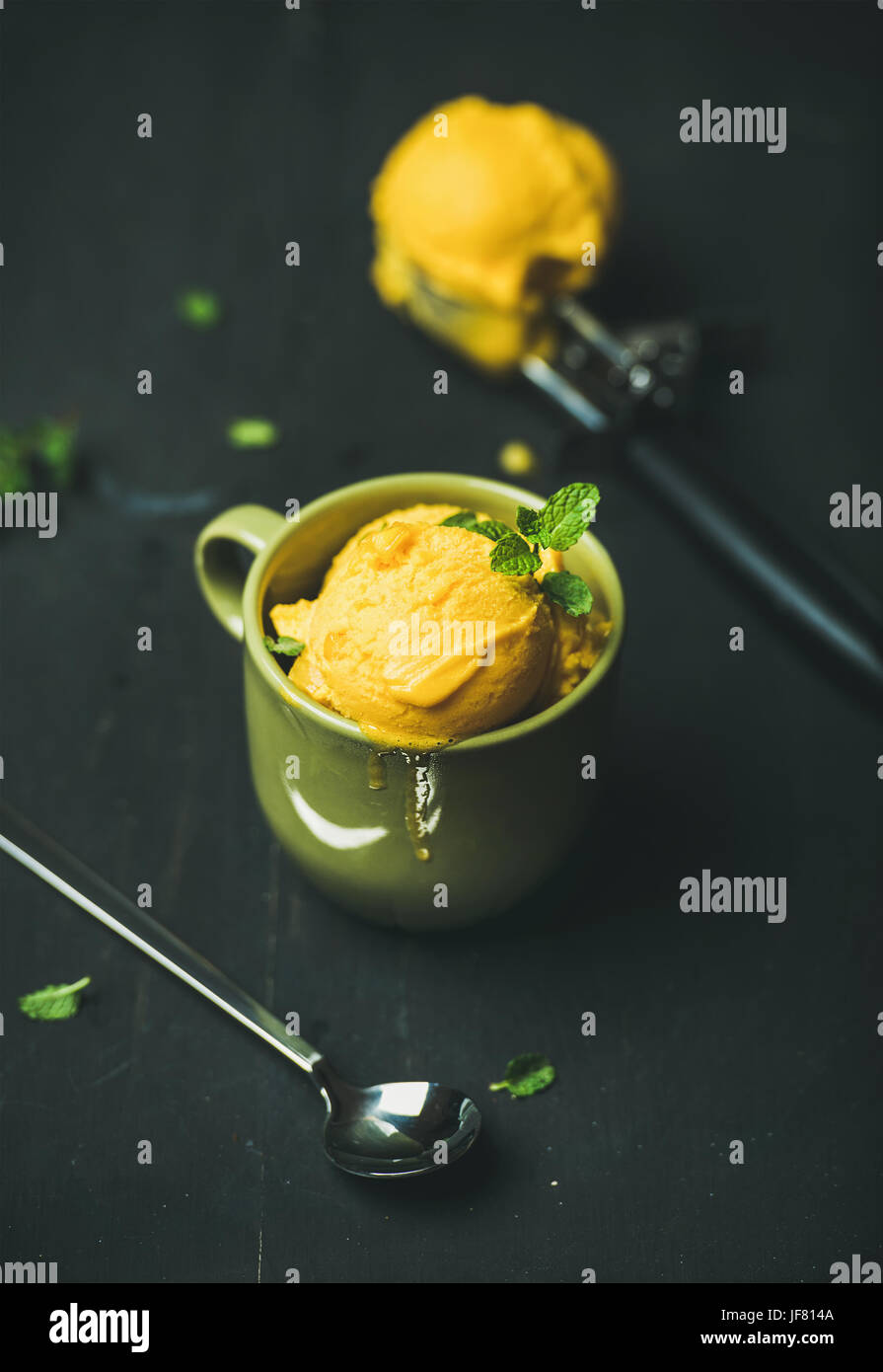 Mango sorbet ice cream scoops with fresh mint Stock Photo - Alamy Mango sorbet ice cream scoops with fresh mint Stock Photo - Alamy