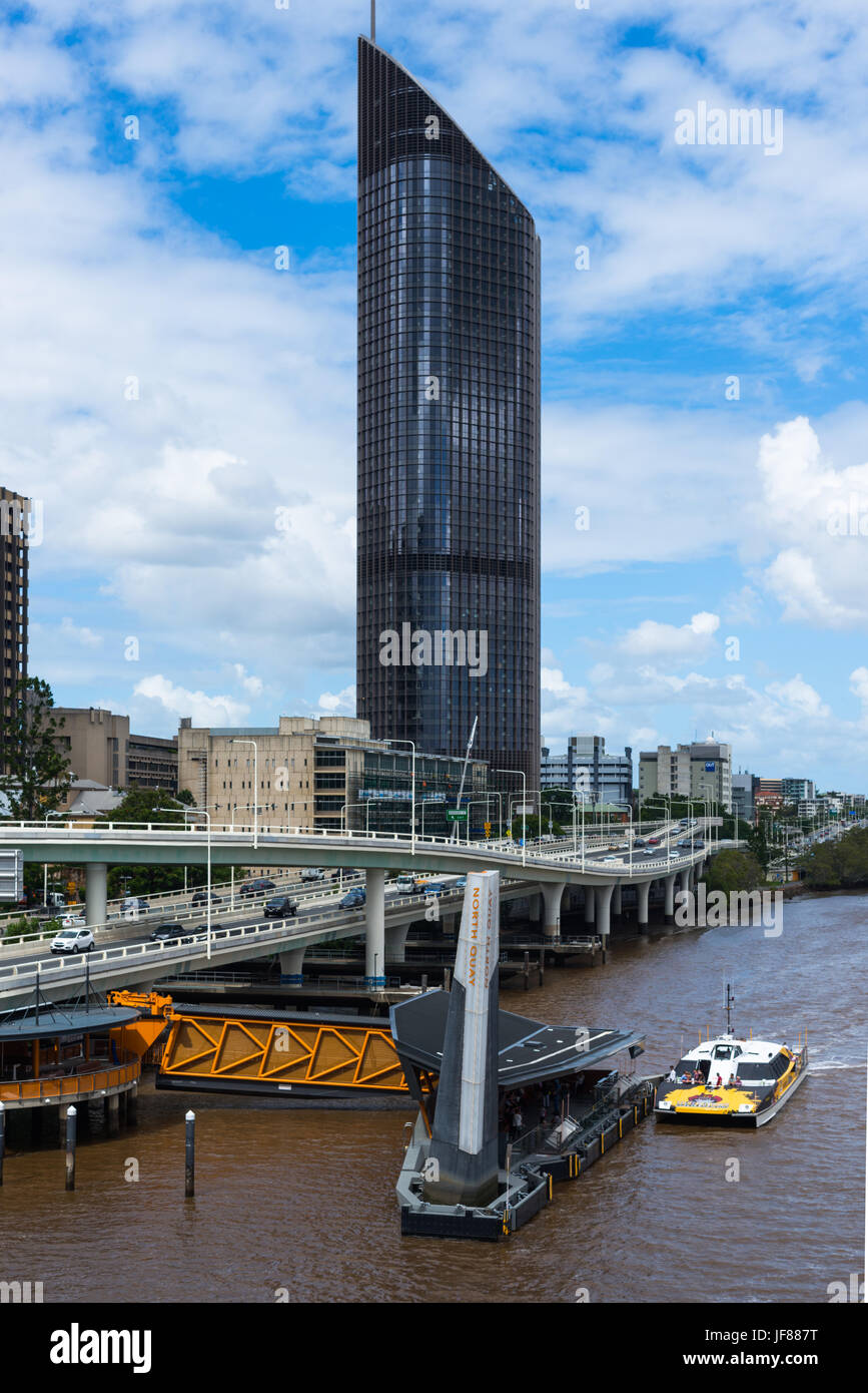 Boat station on Brisbane river with 1 William Street government administration tower block to the rear. Brisbane. Australia. Stock Photo