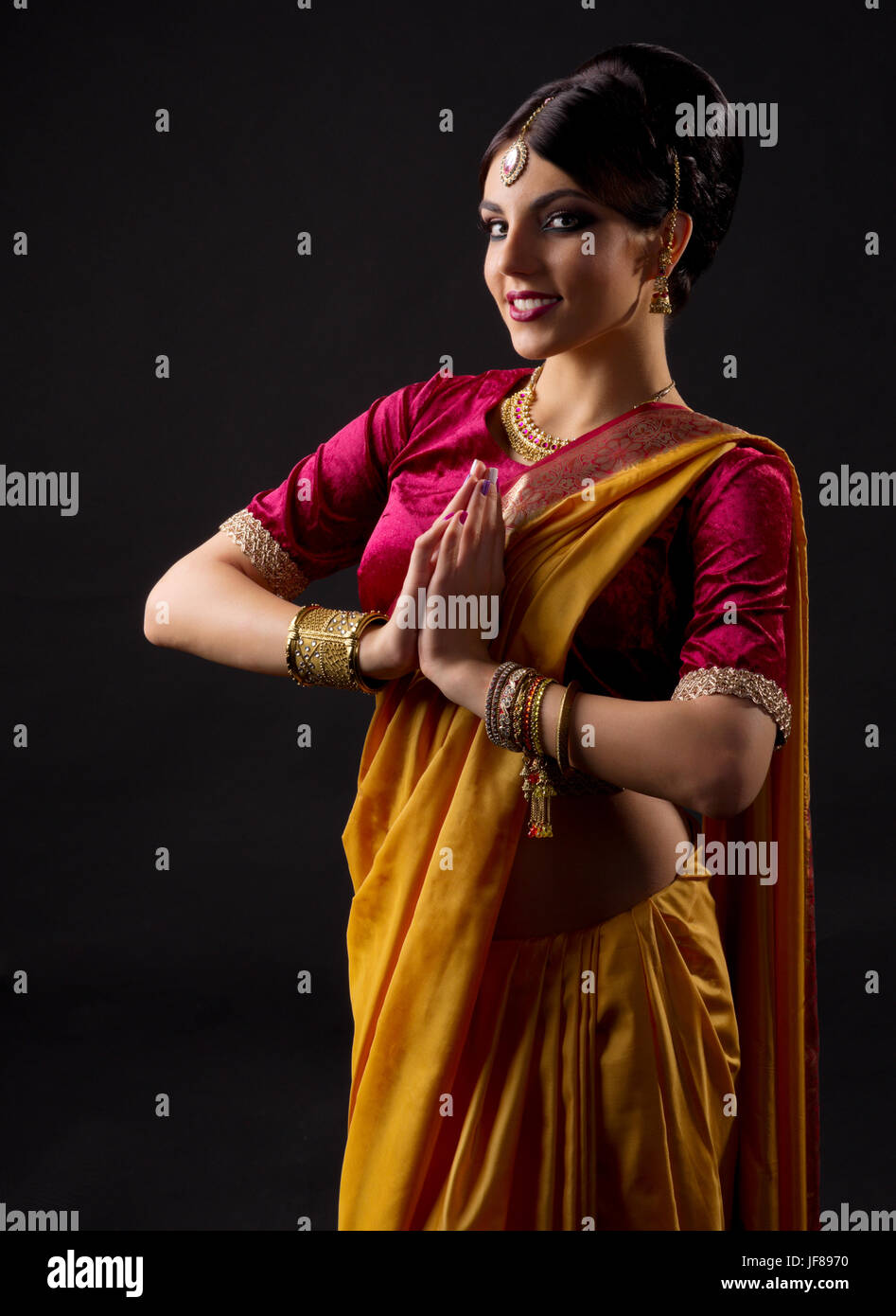 Young indian girl isolated on black Stock Photo