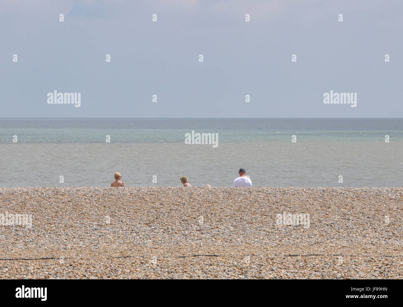 Family at beach back view england hi-res stock photography and images ...