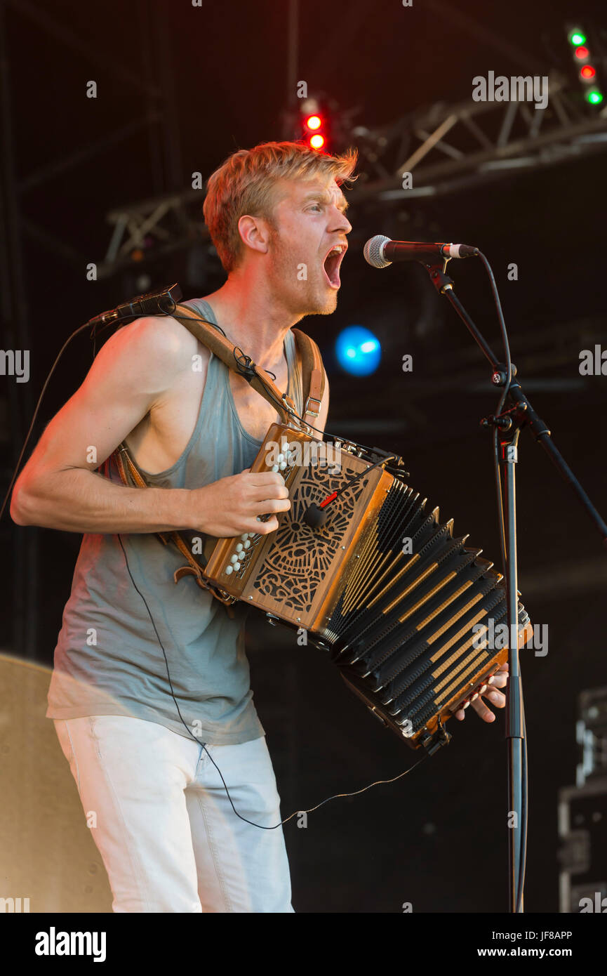 Dundrennan Scotland, UK - July 25, 2014: Maxwell Thomas of Skinny Lister, performing at the Wickerman Festival Stock Photo