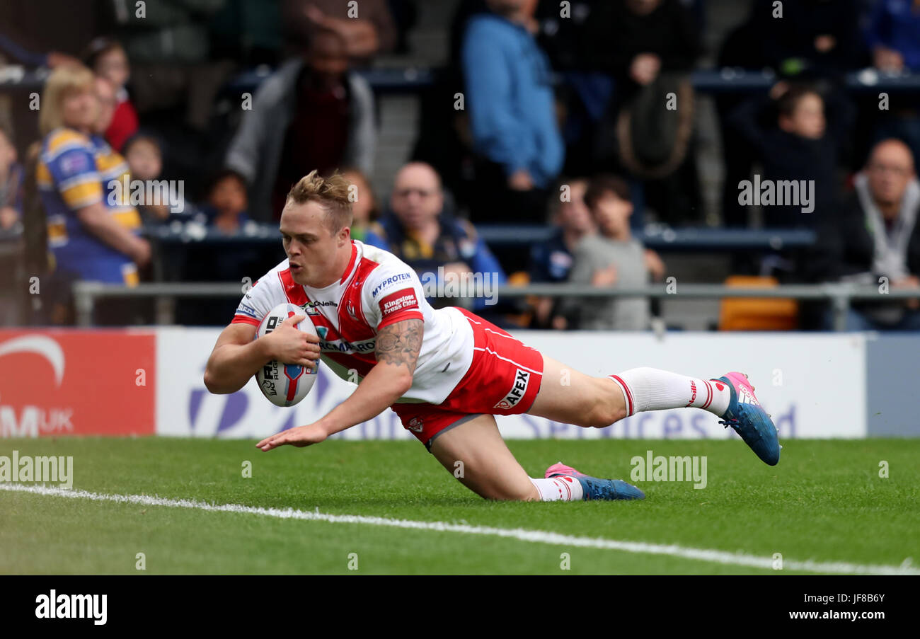 St Helen's Adam Swift dives in to score his first try of the game during the Betfred Super League match at Headingley Carnegie Stadium, Leeds. Stock Photo