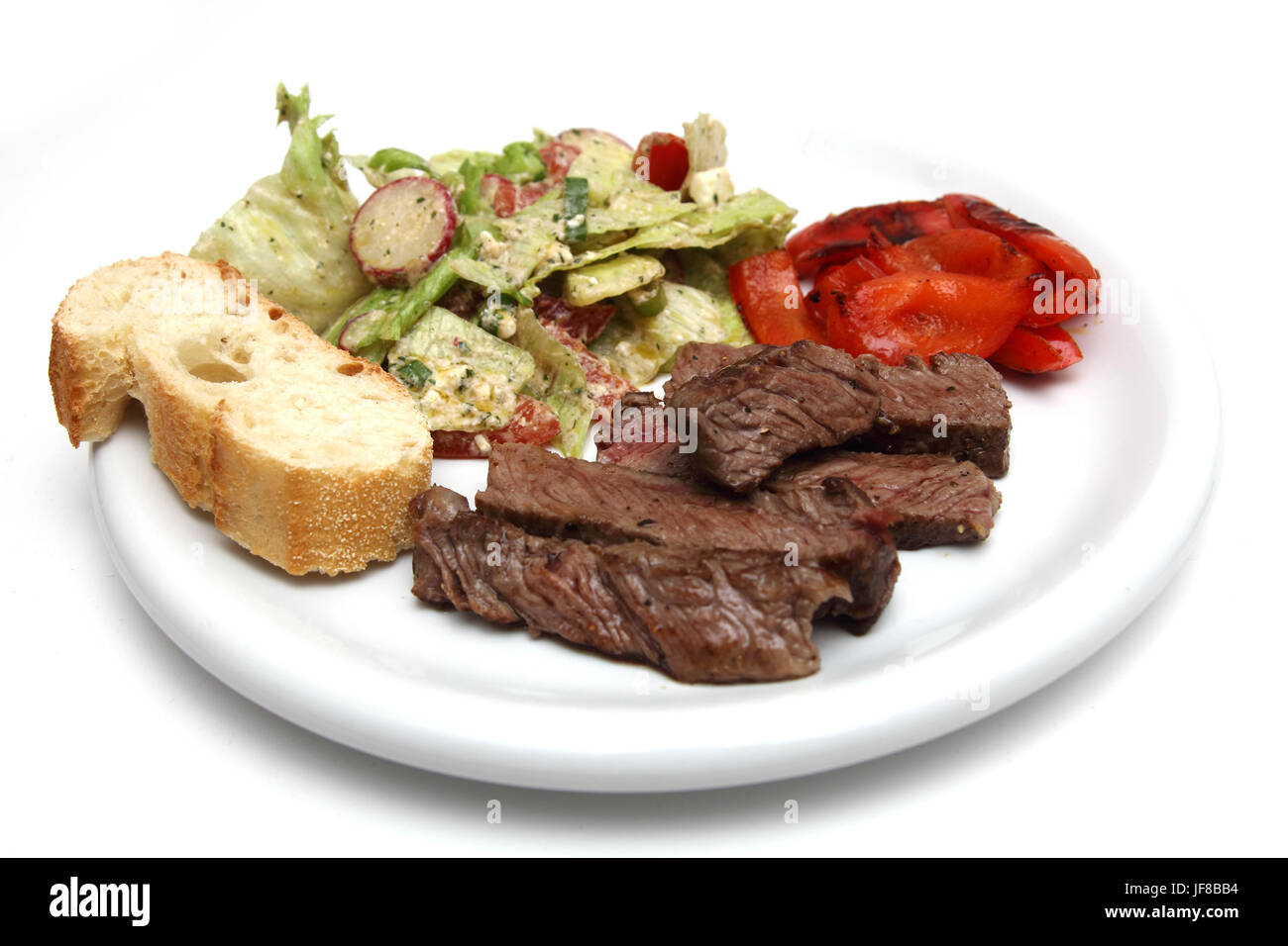 Roastbeef Streifen mit Salat und Baguette Stock Photo