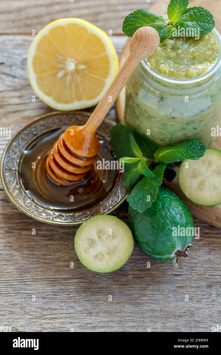 Vitamin cocktail of lemon, honey and pineapple guava Stock Photo Alamy