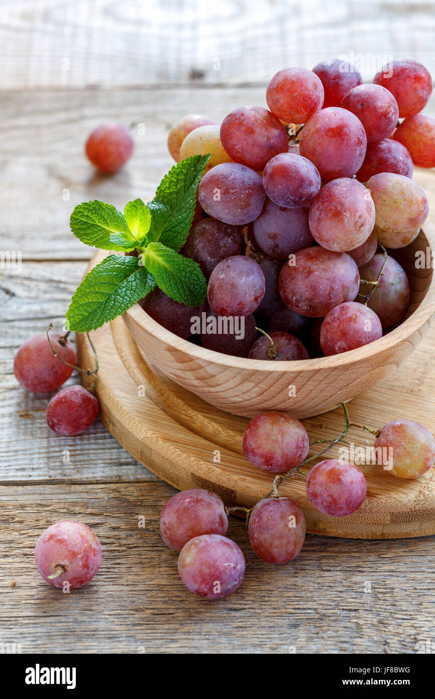 Pink grape with a waxy bloom. Stock Photo