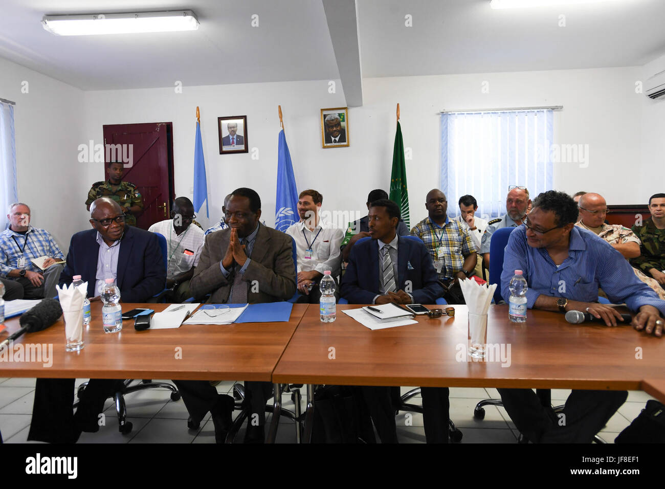 Officials of the United Nations and the African Union Mission in Somalia (AMISOM) attend a meeting of the African Union-United Nations, Federal Government of Somalia joint assessment mission in Mogadishu, Somalia on May 21, 2017. AMISOM Photo / Omar Abdisalan Stock Photo