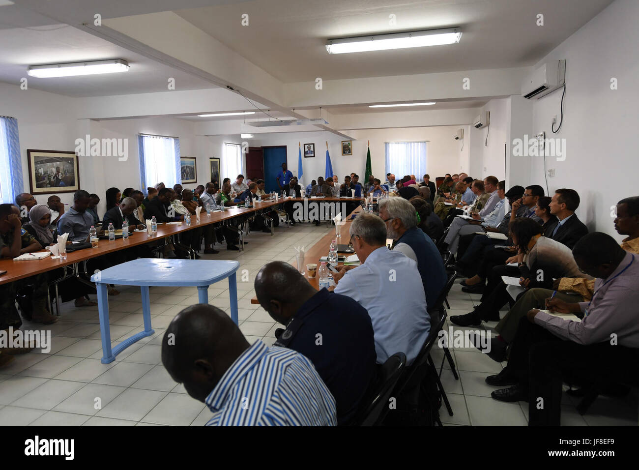 Officials of the United Nations and the African Union Mission in Somalia (AMISOM) attend a meeting of the African Union-United Nations, Federal Government of Somalia joint assessment mission in Mogadishu, Somalia on May 21, 2017. AMISOM Photo / Omar Abdisalan Stock Photo
