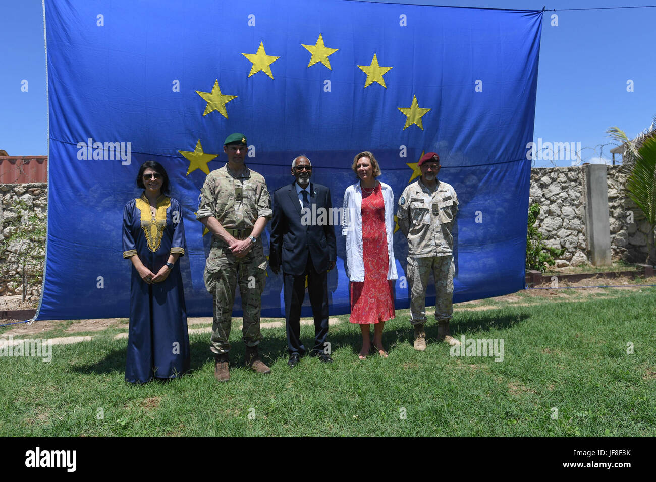 Mohamed Sheikh Osman Jawari, the Speaker of the Somalia Federal Parliament (middle), Veronique Lorenzo, the European Union (EU) Ambassador to Somalia (2nd from right), and senior officials from EU in a group photo during a ceremony to mark Europe Day in Mogadishu on May 09, 2017. AMISOM Photo / Omar Abdisalan Stock Photo