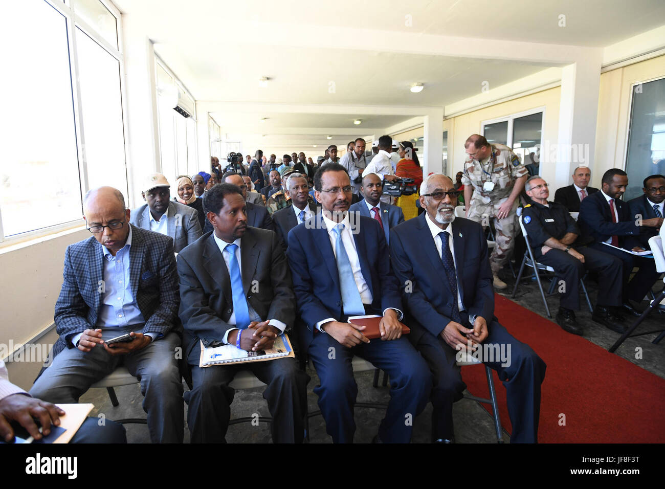 Officials from Somali Federal Government, European Union, diplomats and guests attend a ceremony to mark Europe Day in Mogadishu on May 09, 2017. AMISOM Photo / Omar Abdisalan Stock Photo