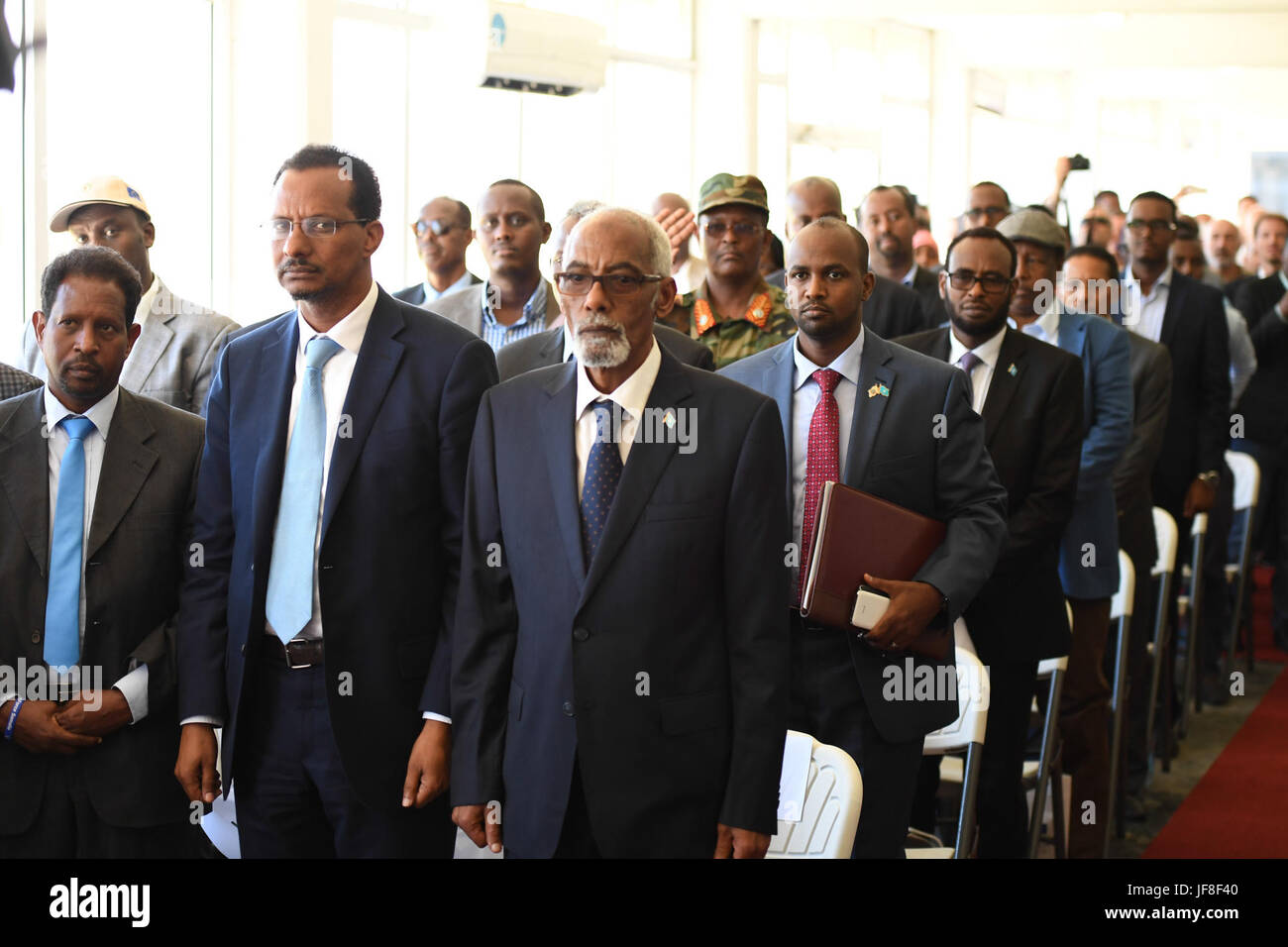 Officials from Somali Federal Government led by the Speaker of the Federal Parliament Mohamed Sheikh Osman Jawari attend a ceremony to mark  Europe Day in Mogadishu on May 09, 2017. AMISOM Photo / Omar Abdisalan Stock Photo