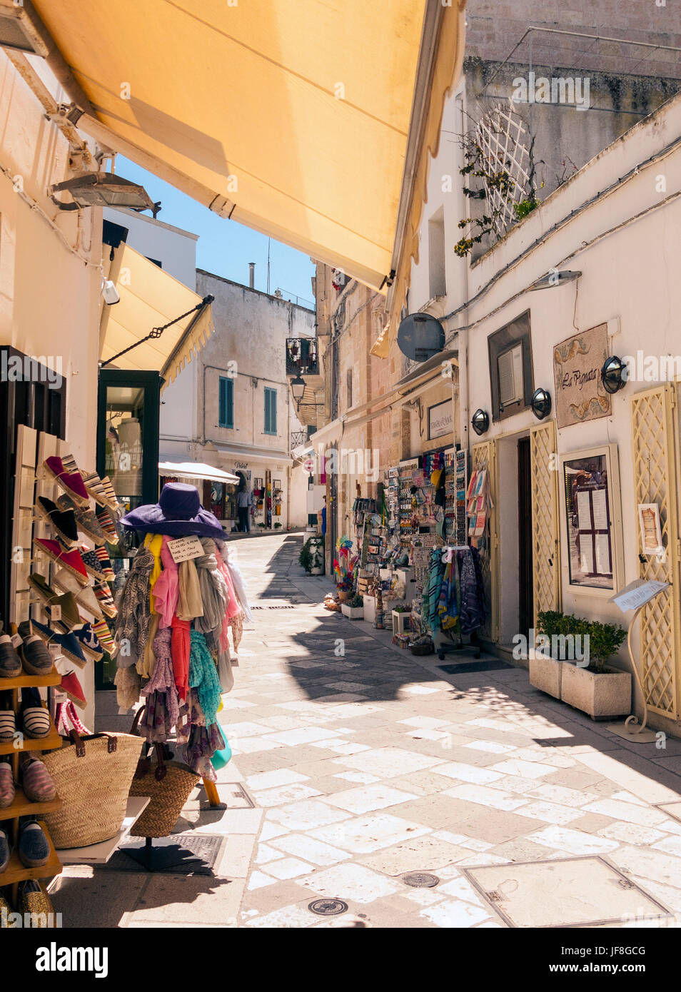 Narrow street in the old town in Otranto, Puglia, Italy Stock Photo