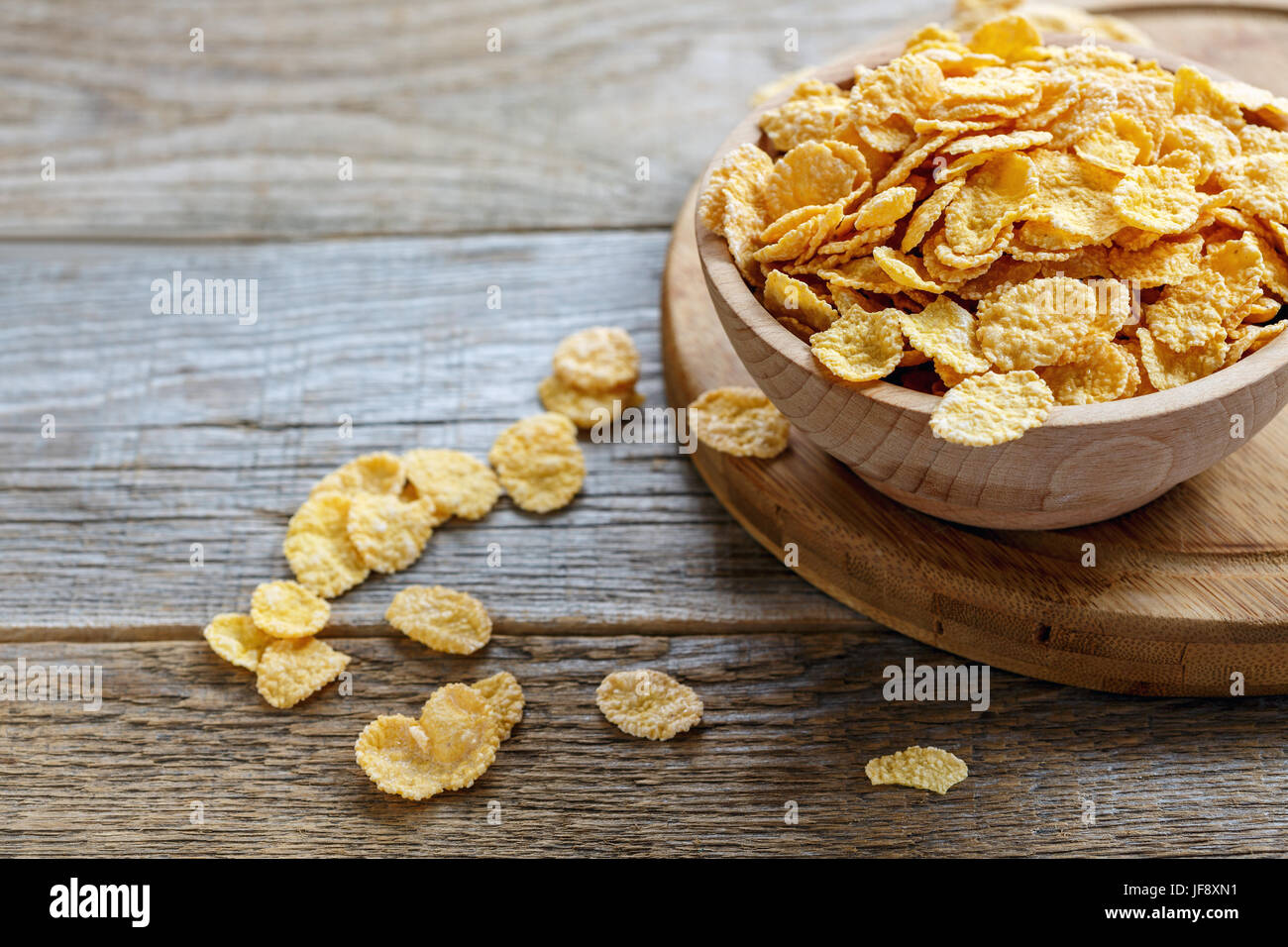 Bowl with crunchy cornflakes for breakfast. Stock Photo