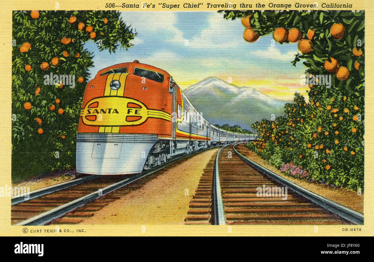 Santa Fe 'Super Chief' streamliner train travelling through orange