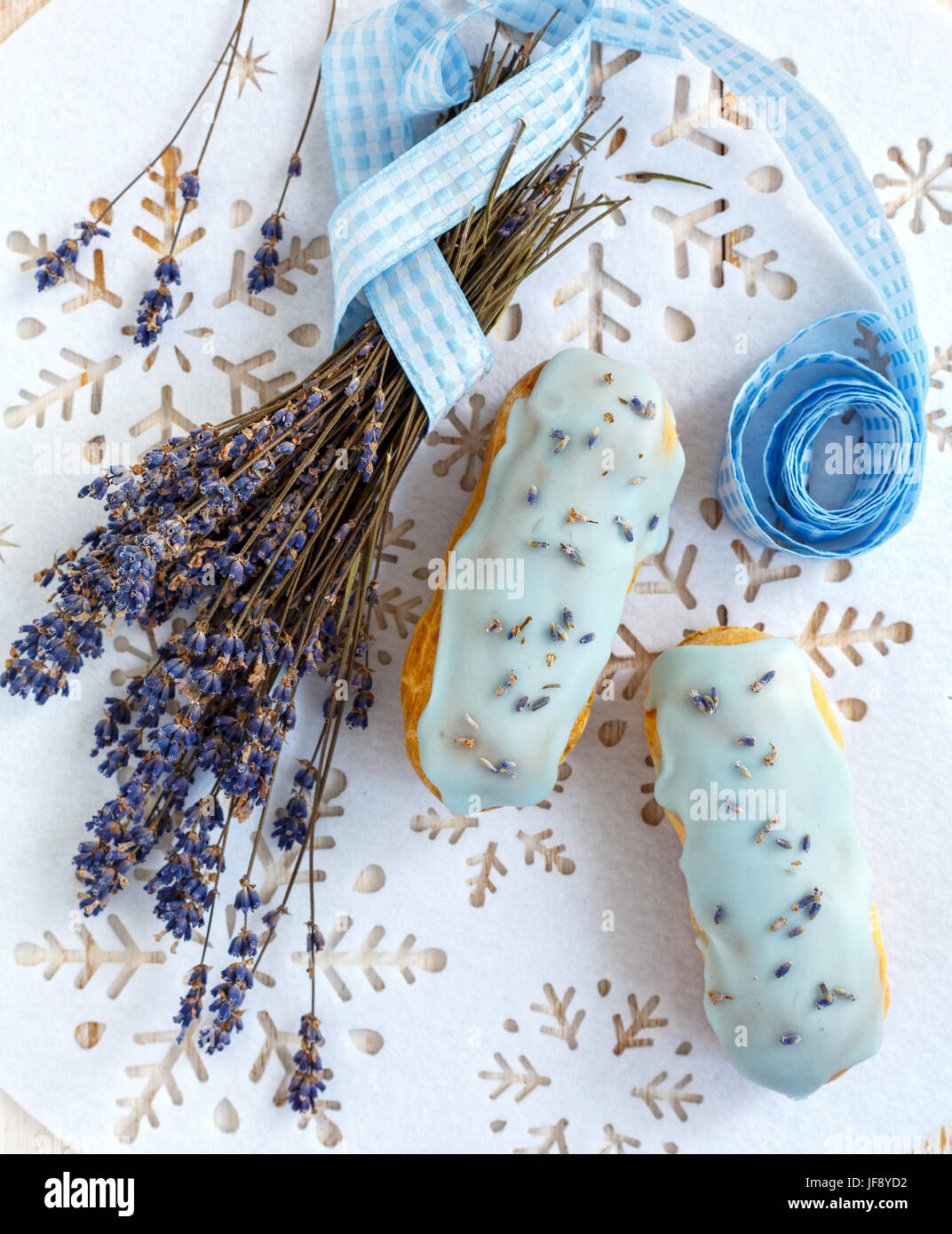Eclairs with Lavender Stock Photo - Alamy