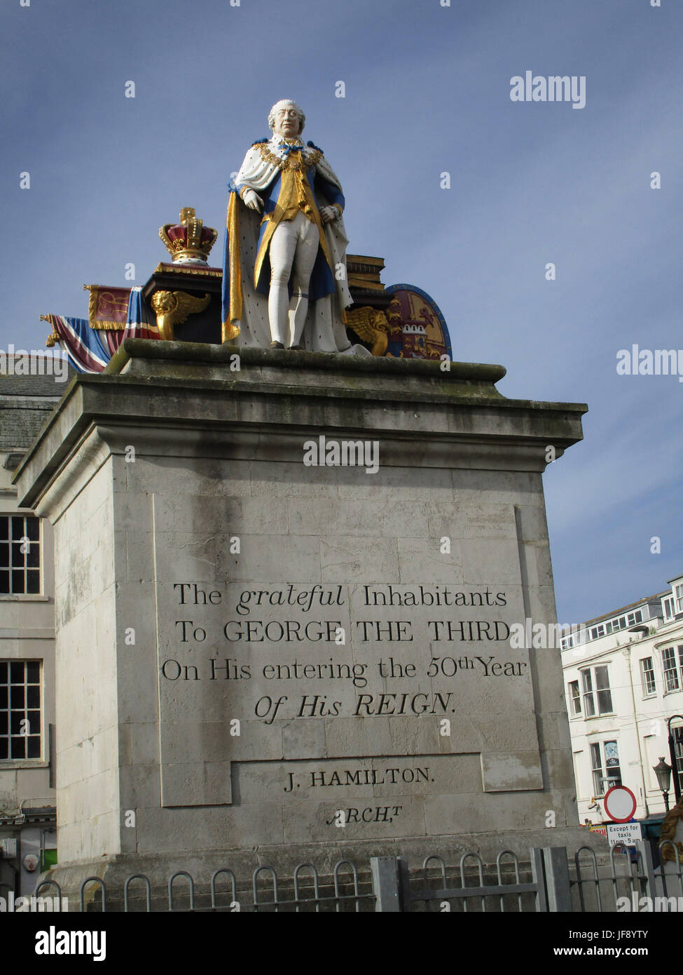 King’s Statue -  statue of George III in his coronation robes on Weymouth seafront. Foundation stone was laid at the end of the Esplanade in 1809 and unveiled 1810r. It has been painted in heraldic colours since 1949. Stock Photo
