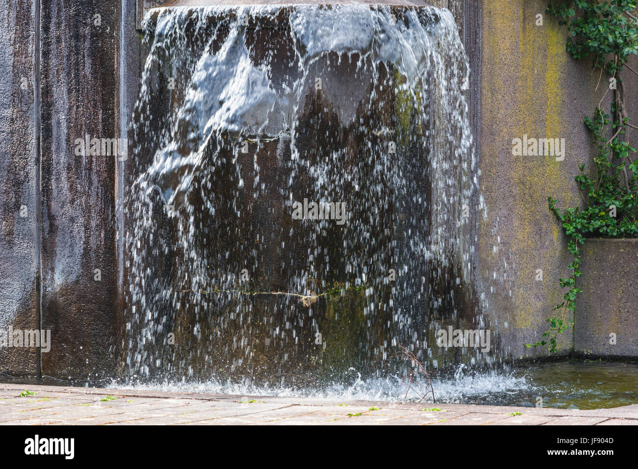 Artificially designed waterfall, fountain Stock Photo Alamy