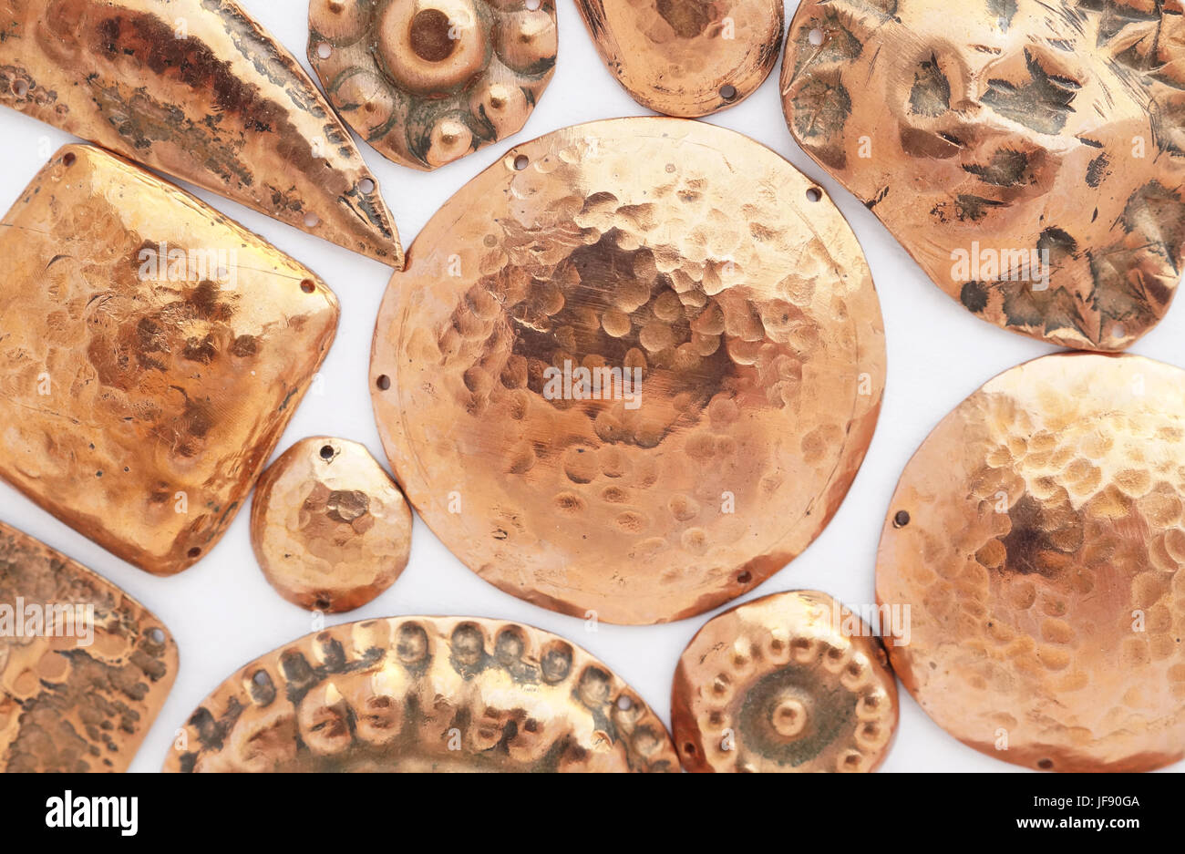 Hand made ethnic copper medallions Stock Photo