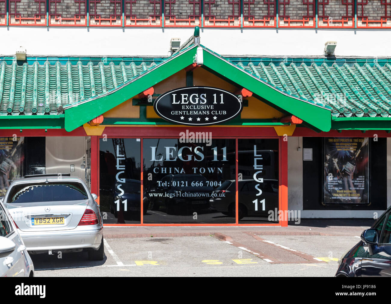 Exterior and entrance area of Legs 11, an 'exclusive gentleman's club' in the Chinatown area of Birmingham, England, USA Stock Photo