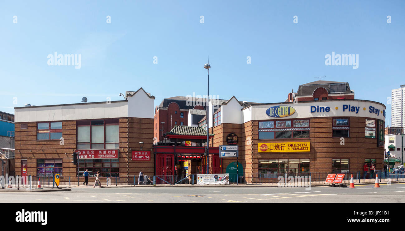 Exterior of the Day In Oriental Supermarket and the Sum Ye Chinese Restaurant and fast food