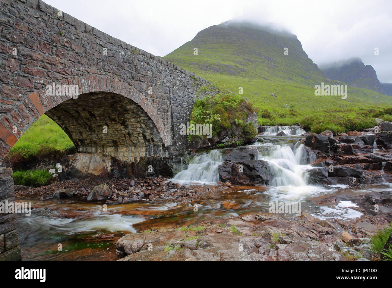 An old bridge and the river Russel on the road leading to Bealach na Ba pass near Applecross in the Northern Highlands, Scotland, UK Stock Photo