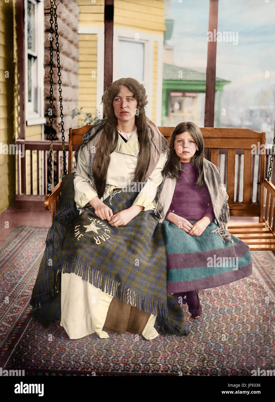 Titanic Survivors Charlotte and Majorie Collyer in 1912 - Charlotte Collyer and her daughter Marjorie were 2nd Class English survivors of the Titanic. They not only tragically lost a beloved husband and father Harvey Collyer in the disaster - but all their worldly possessions and £5,000 in cash was also lost forever when Titanic sank. Out of all the survivors who were photographed after the disaster - their faces show the extreme stress and the terrible trauma the women and children lived through on that fateful night, more than any other image. Stock Photo