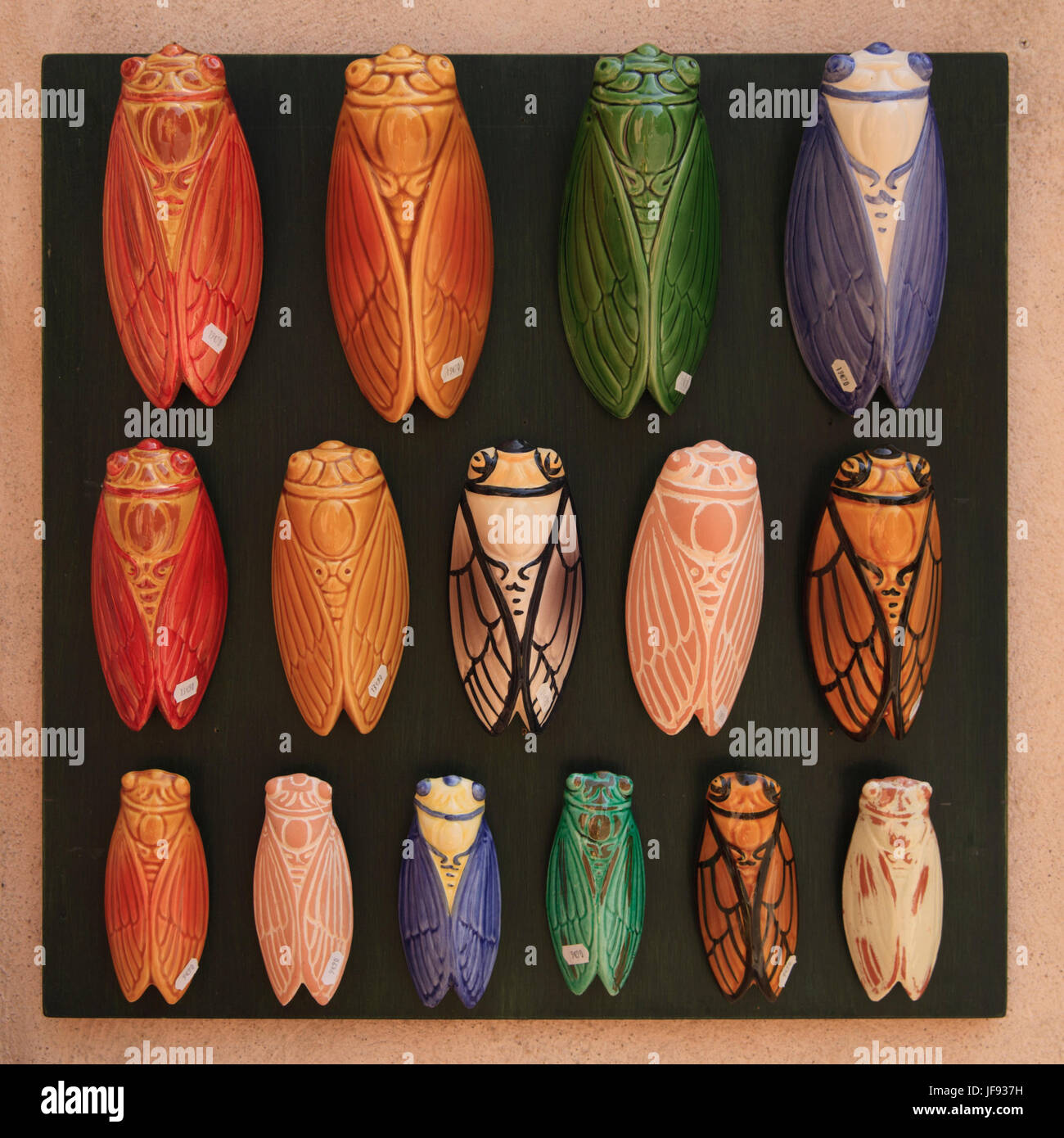 Cicada wall hangings for sale in Castellet, Provence, France Stock Photo