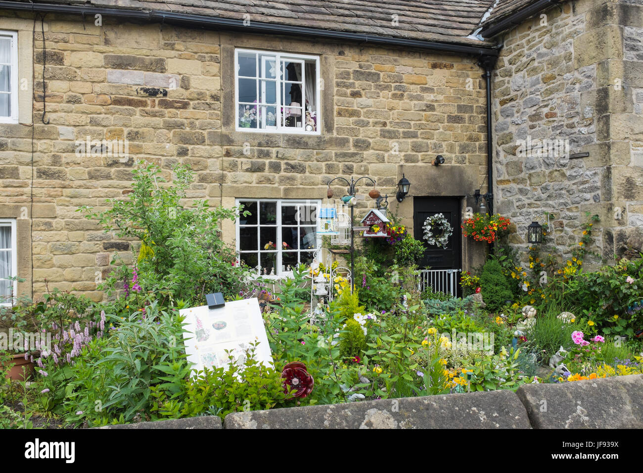 Plague Cottage, the site of the first plague death in the village of Eyam in the Derbyshire Peak District Stock Photo