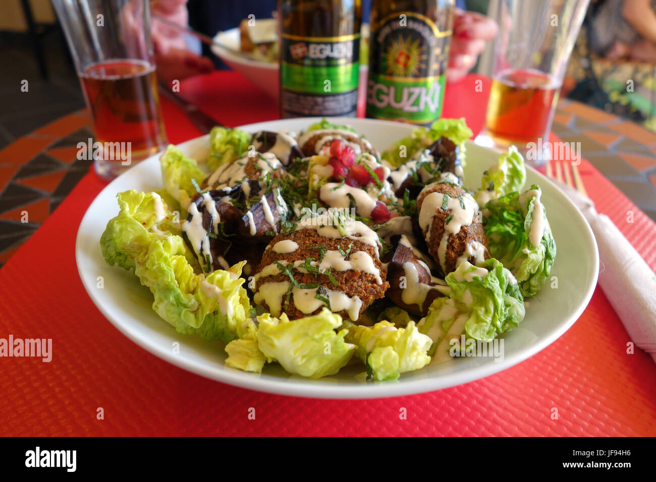Vegetarian organic salad 'Salade de Falafel' with Taboulet Libanais, Humus et Aubergines Grillees Stock Photo