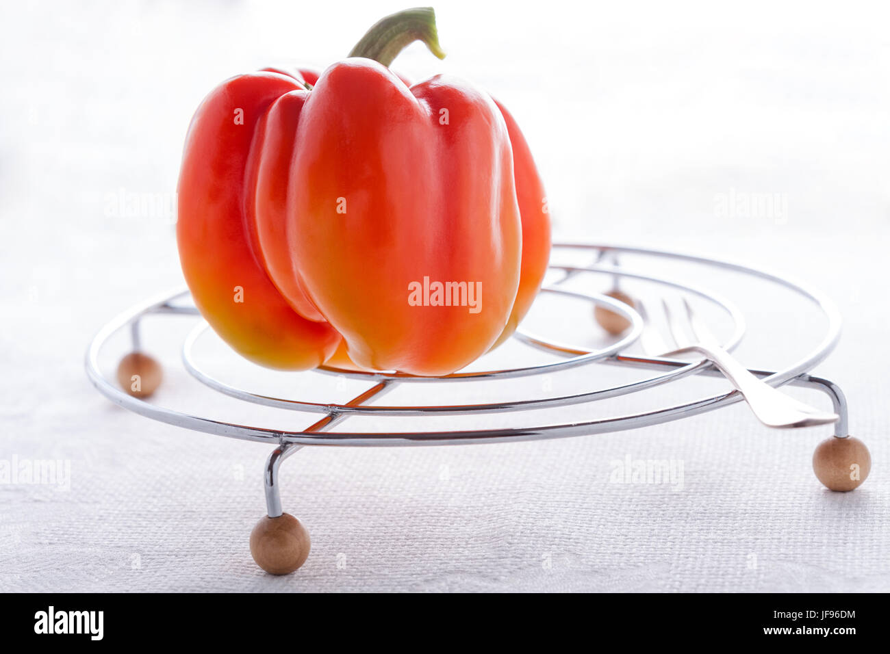 Red Fresh Pepper on the white table Stock Photo