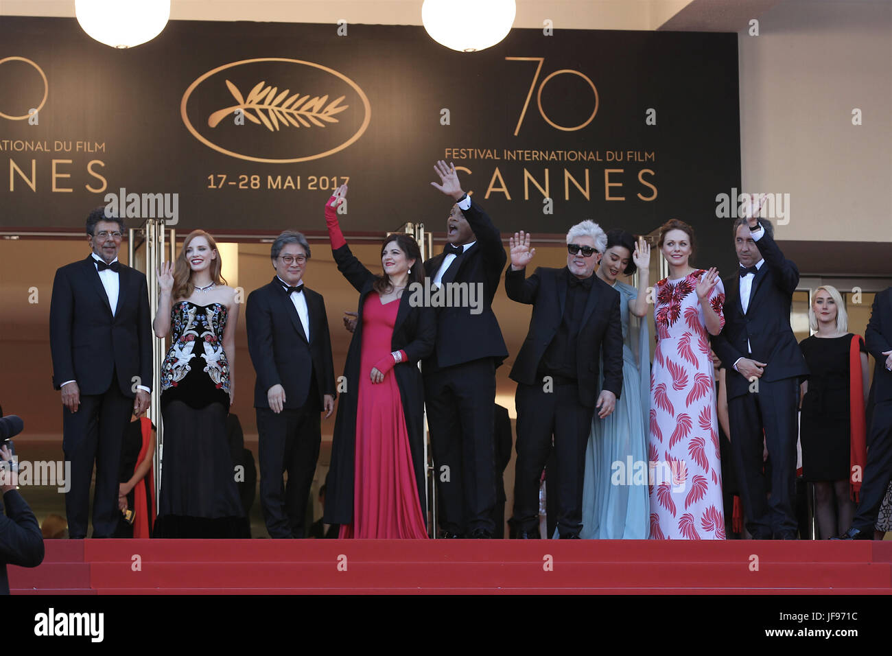 (L-R) Gabriel Yared, Jessica Chastain, Park Chan-wook, Agnes Jaoui and Will Smith, Pedro Almodovar, Fan Bingbing, Maren Ade and Paolo Sorrentino attend the Ismael's Ghosts screening and Opening Gala during the 70th annual Cannes Film Festival at Palais des Festivals on May 17, 2017 in Cannes, France. Stock Photo