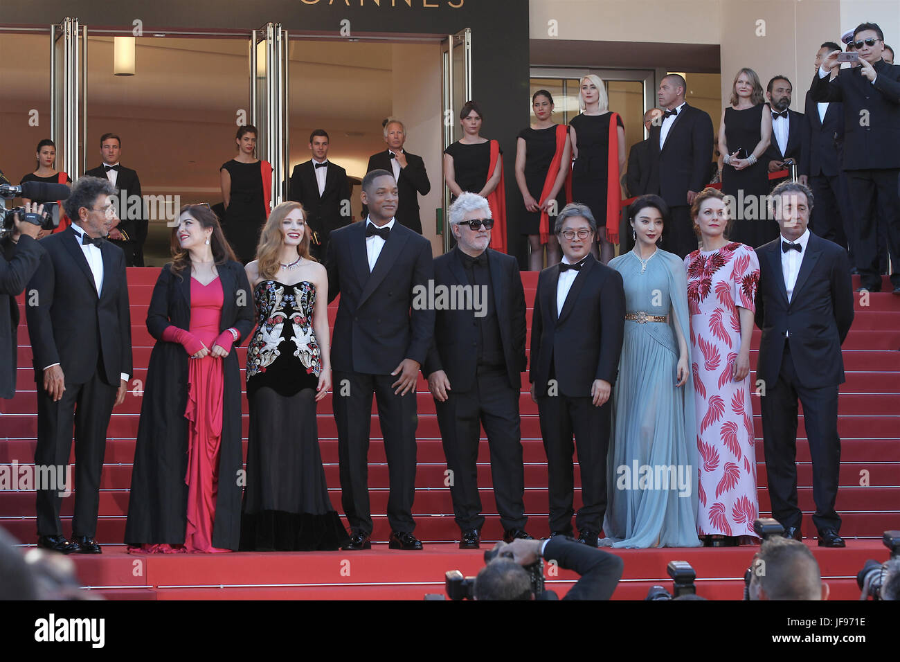 (L-R) Gabriel Yared, Jessica Chastain, Park Chan-wook, Agnes Jaoui and Will Smith, Pedro Almodovar, Fan Bingbing, Maren Ade and Paolo Sorrentino attend the Ismael's Ghosts screening and Opening Gala during the 70th annual Cannes Film Festival at Palais des Festivals on May 17, 2017 in Cannes, France. Stock Photo