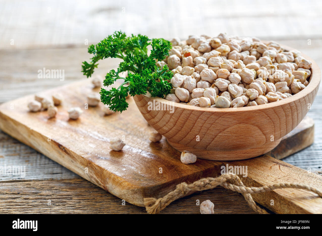 Chickpea and a sprig of parsley. Stock Photo
