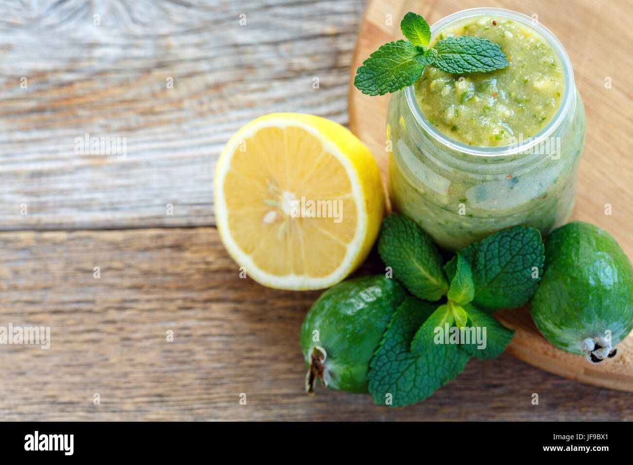 Feijoa fruit pureed with lemon and mint. Stock Photo
