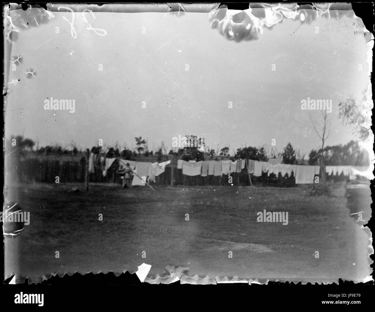 A candid photograph of laundry hanging on a clothesline in the Wagga Wagga region of New South Wales, capturing everyday life in Australia. Stock Photo