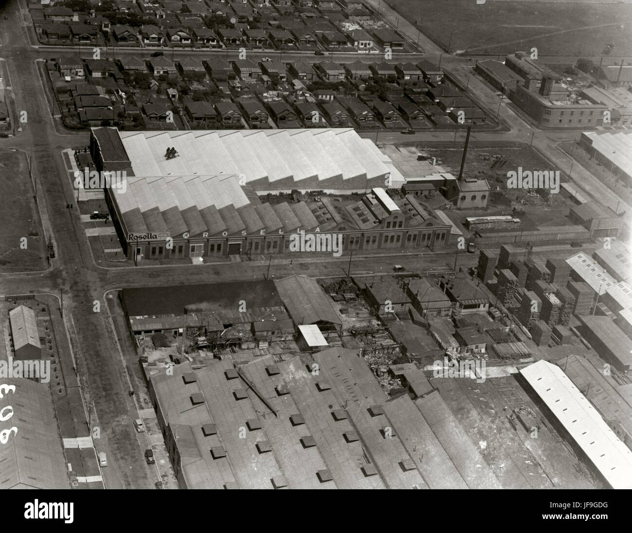 A historical image from the Rosella Manufacturing Company, showcasing the company's role in Australian industry through aerial photography. Stock Photo