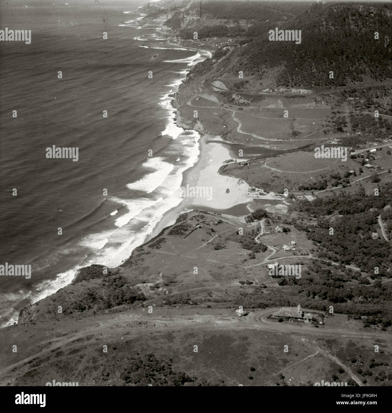 An aerial photograph taken on November 17, 1937, showing the scenic South Coast and Stanwell Park, part of the Adastra Aerial Survey Collection Stock Photo