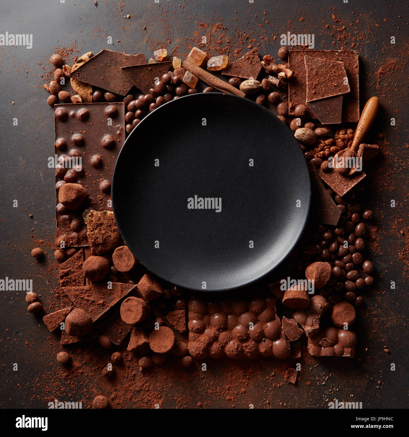 frame of chocolates with plate Stock Photo
