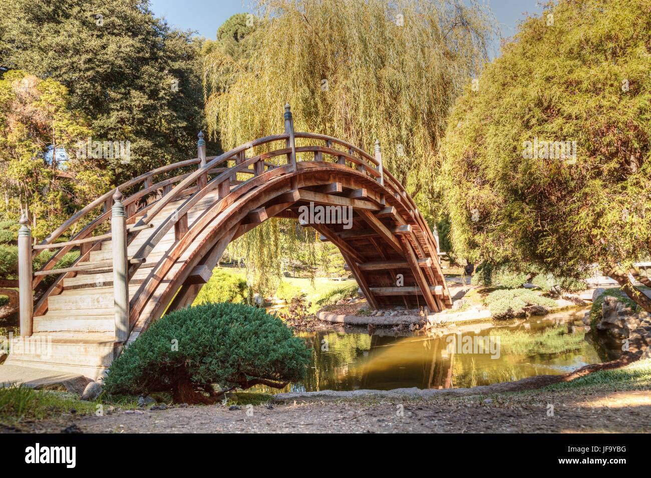 Arched wooden bridge in the Japanese garden Stock Photo Alamy