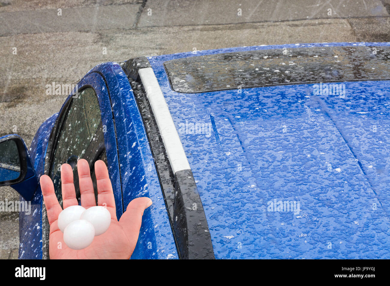 Hail on a car roof. Stock Photo
