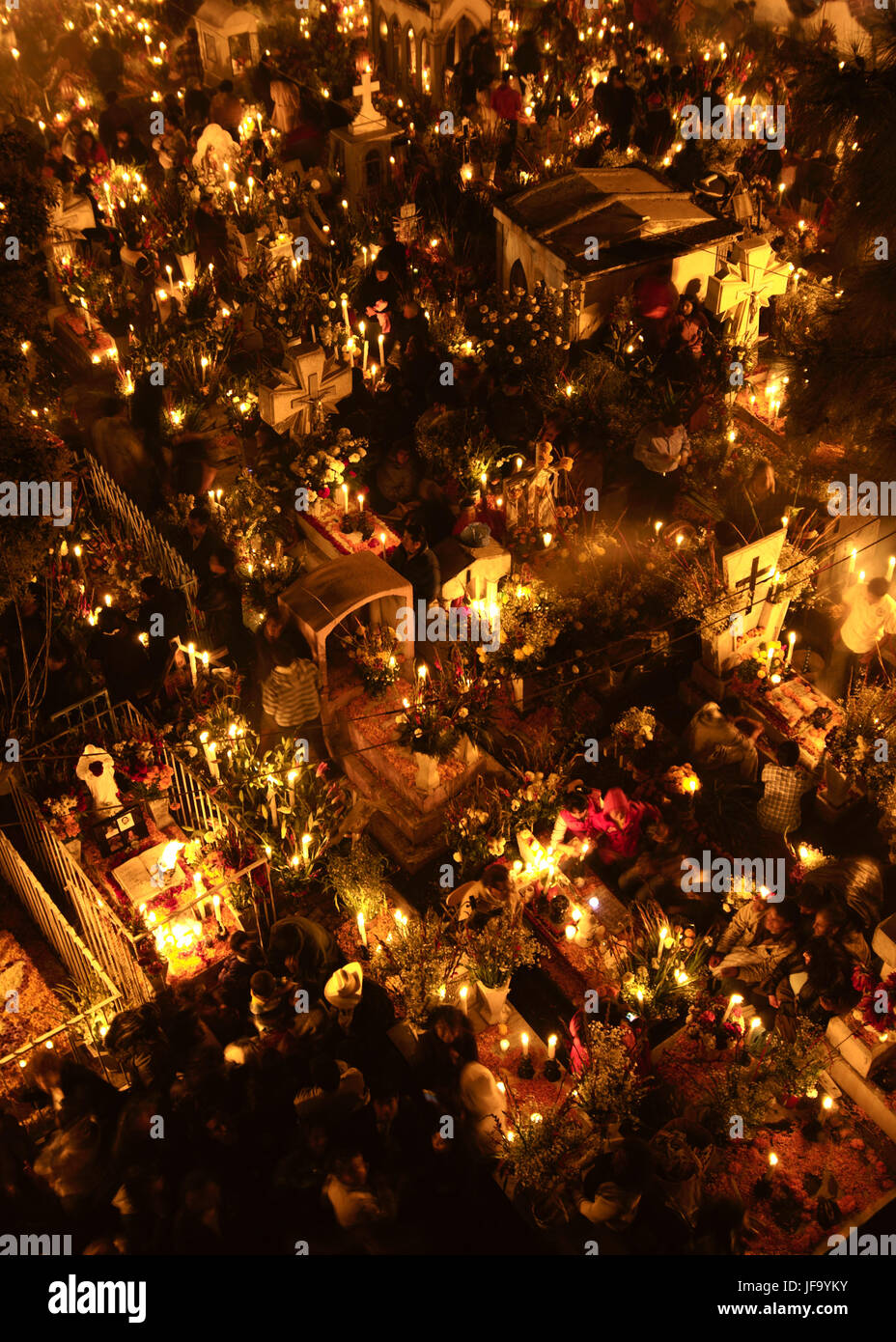 SAN ANDRÉS MIXQUIC, MEXICO - NOVEMBER 2012: Annual commemorations known as 'La Alumbrada' during the day of the dead (día de muertos). Stock Photo