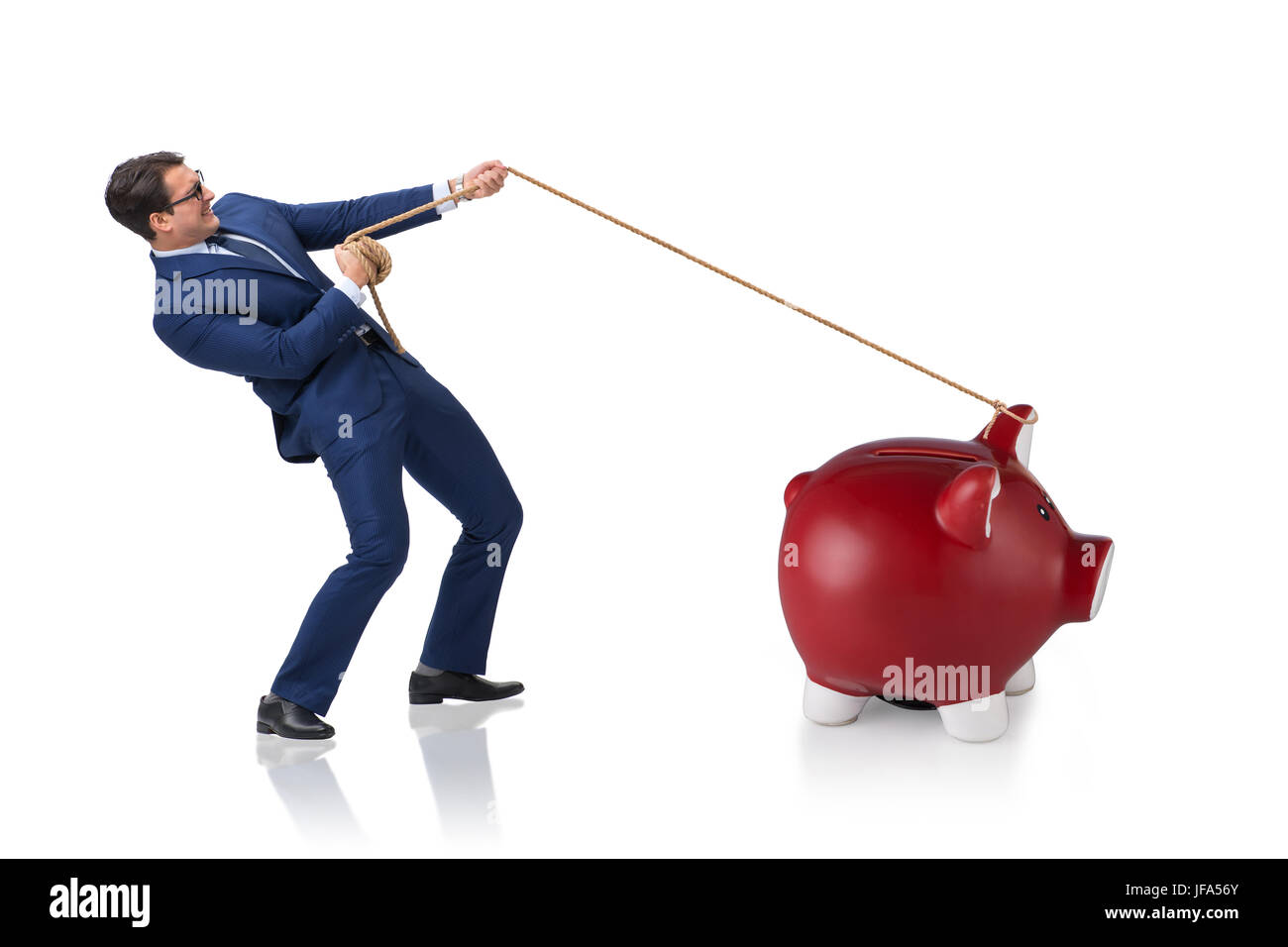 Businessman pulling piggybank with rope Stock Photo - Alamy