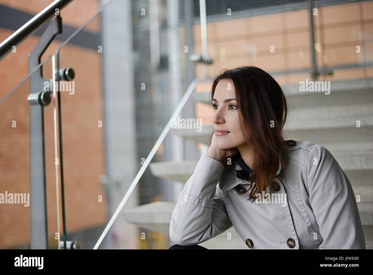 smiling businesswoman in the city Stock Photo